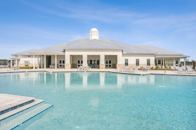 view of swimming pool featuring a patio