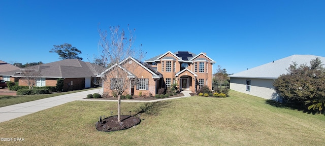 view of front of home with a front yard