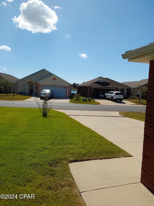 view of yard with a garage