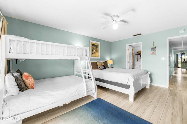 bedroom featuring light wood-type flooring and ceiling fan