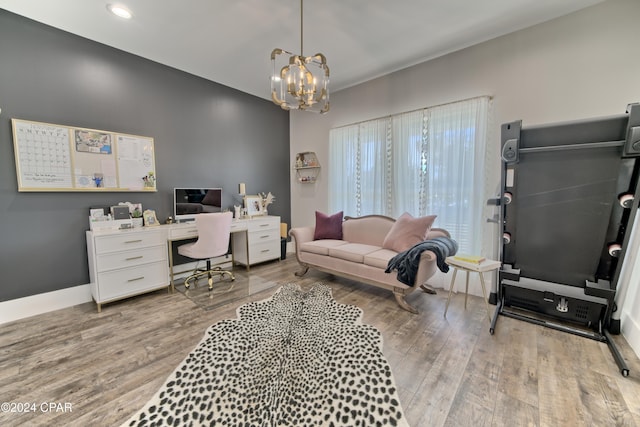 office area featuring hardwood / wood-style floors and a chandelier