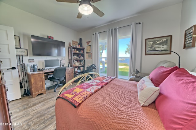 bedroom featuring ceiling fan and light hardwood / wood-style floors