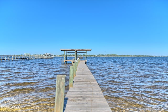 dock area featuring a water view