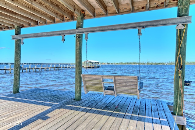 view of dock featuring a water view