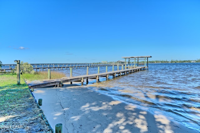 dock area featuring a water view