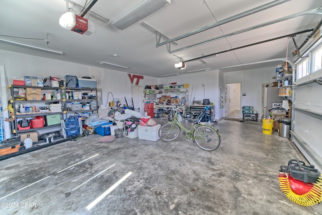 garage featuring a garage door opener