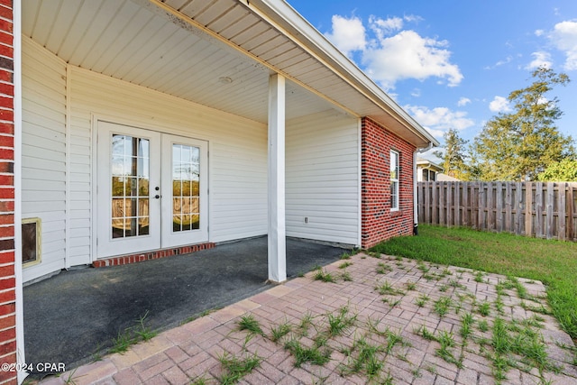 2405 Camryns Xing, Panama City, FL 32405 - view of patio featuring french doors and fence