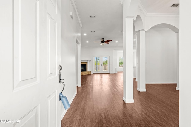 hallway featuring crown molding and dark wood-type flooring