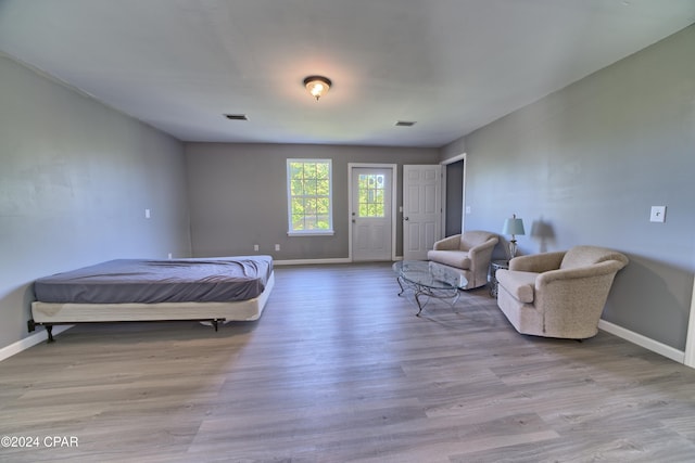 bedroom with light wood-type flooring