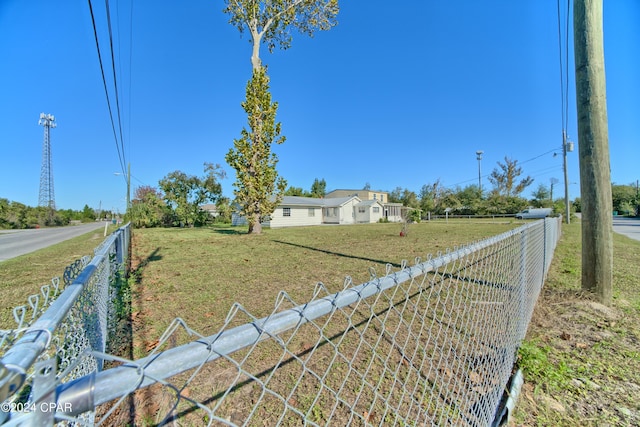 view of yard with a rural view