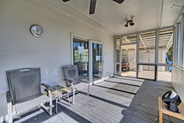 wooden deck with ceiling fan