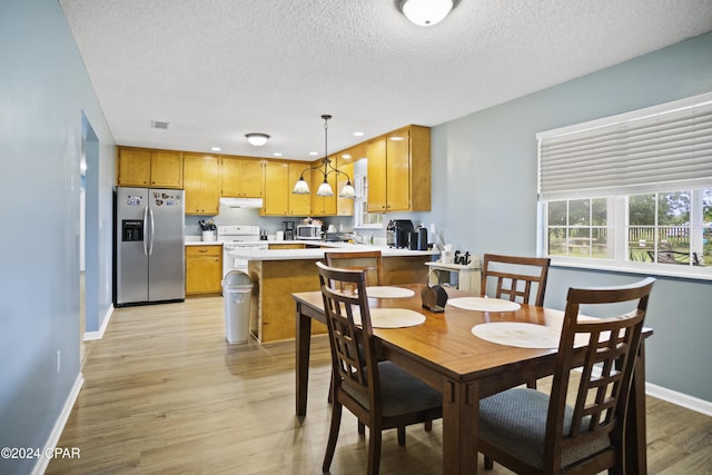 18496 NE Live Oak Ln, Blountstown, FL 32424 - dining space with a textured ceiling, light wood-style floors, baseboards, visible vents, and recessed lighting