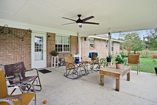 view of patio / terrace featuring ceiling fan