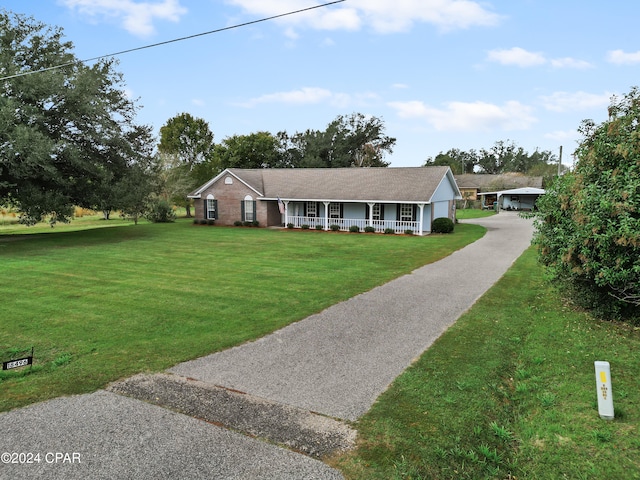 single story home with a porch and a front yard