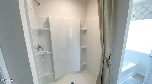 bathroom featuring a shower with curtain