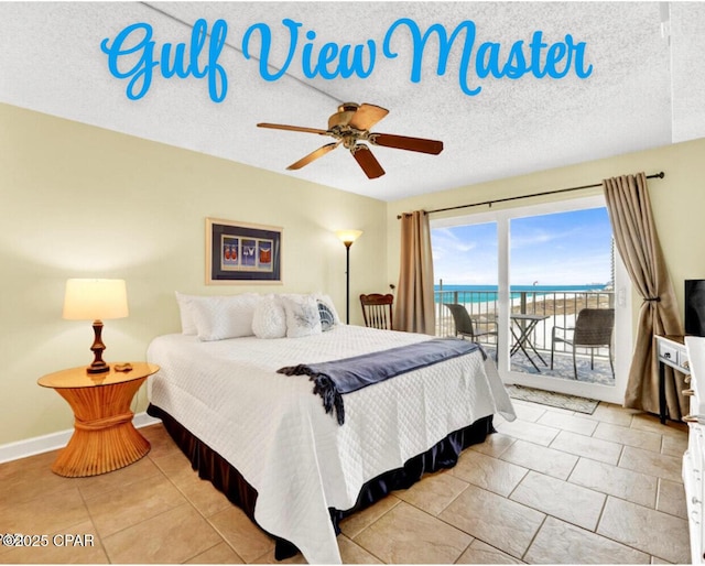 bedroom with baseboards, a ceiling fan, tile patterned floors, access to outside, and a textured ceiling