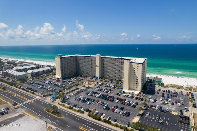 aerial view featuring a water view and a beach view