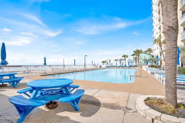 pool featuring a patio area