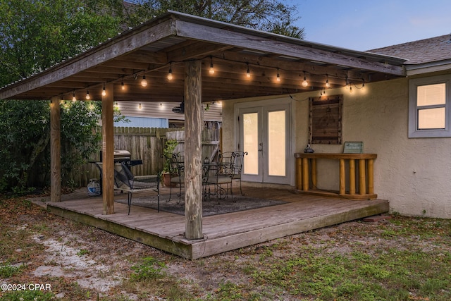 deck at dusk with french doors