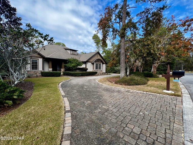 view of front of home with a front lawn