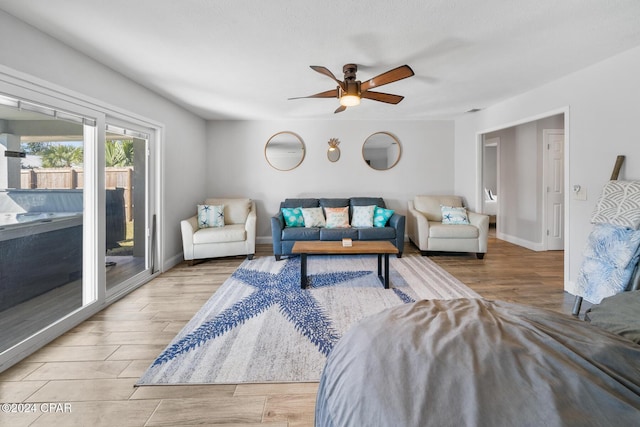 living room with ceiling fan