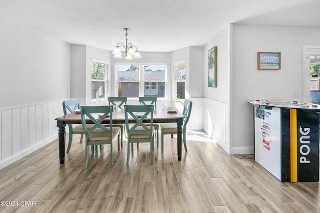 dining room with a notable chandelier