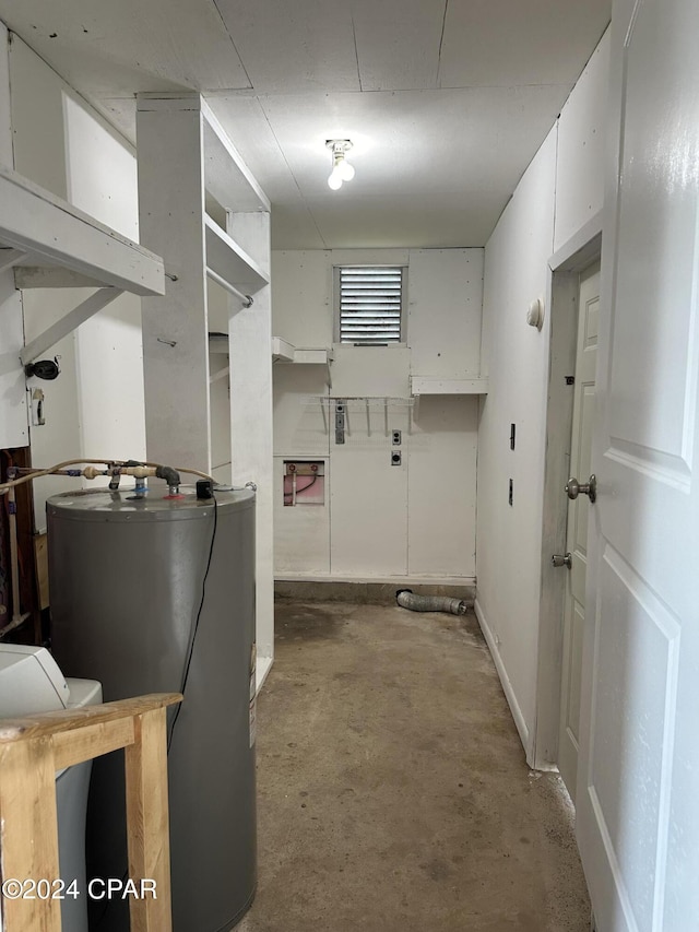 laundry room featuring gas water heater