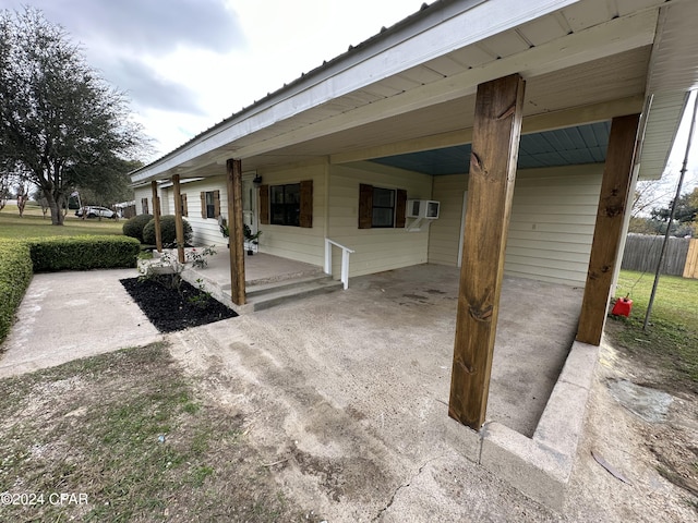 view of patio featuring a carport