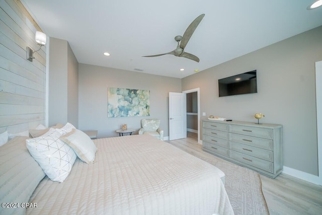 bedroom featuring light wood-type flooring and ceiling fan