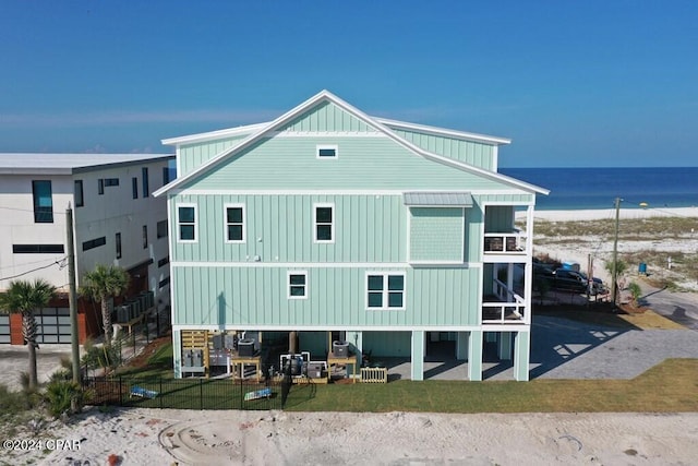 exterior space with a water view