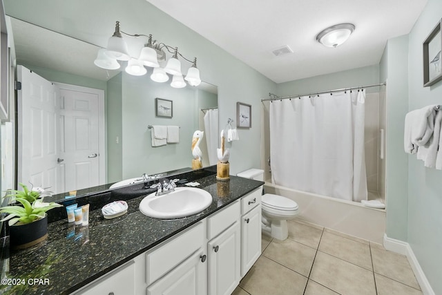 bathroom with tile patterned flooring, toilet, shower / tub combo, vanity, and visible vents