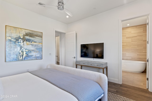 bedroom with hardwood / wood-style floors and ceiling fan