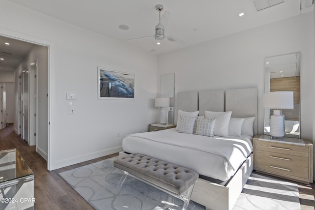 bedroom featuring ceiling fan and dark wood-type flooring