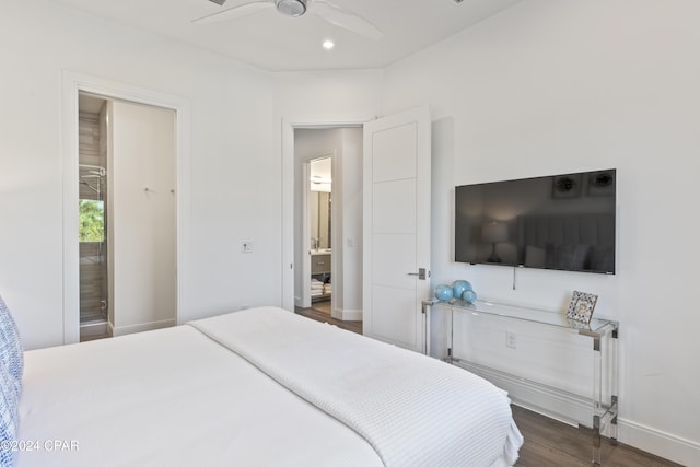 bedroom with ceiling fan and dark wood-type flooring