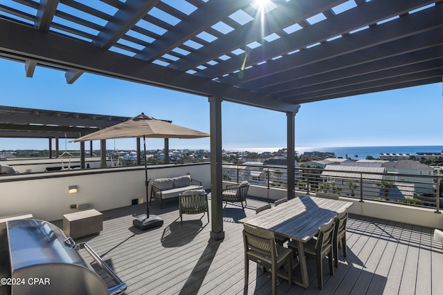 wooden deck featuring a pergola, a grill, an outdoor living space, and a water view