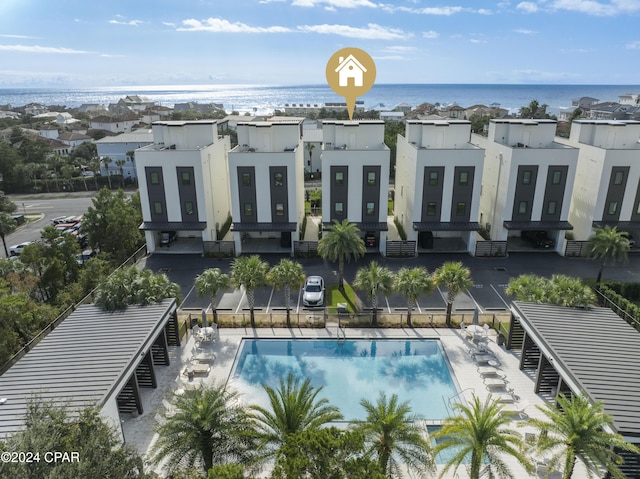 view of pool featuring a water view