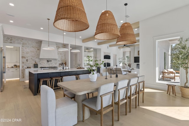 dining area featuring light wood-type flooring