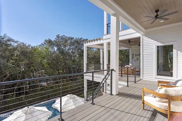 wooden deck with ceiling fan