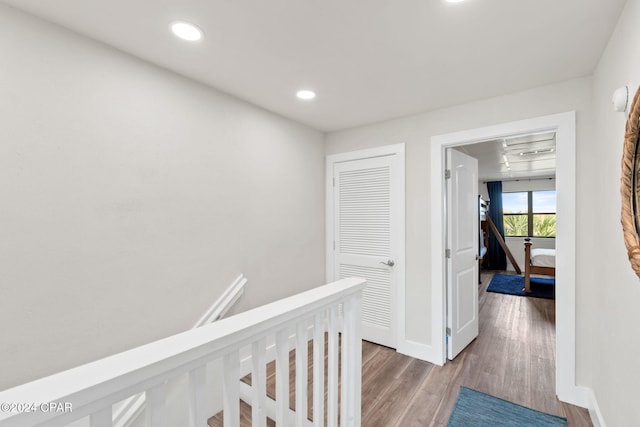 corridor featuring hardwood / wood-style flooring