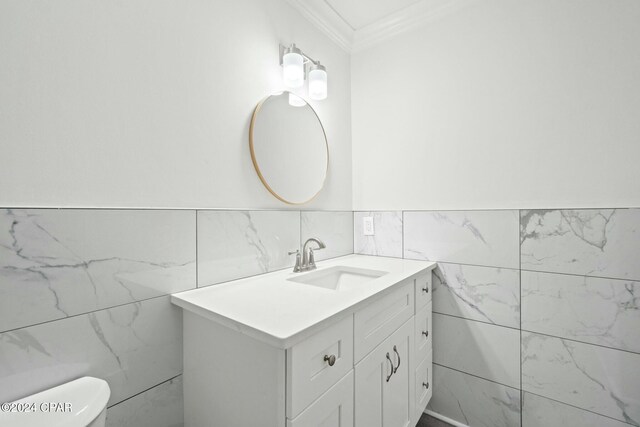 kitchen with white cabinets, decorative backsplash, appliances with stainless steel finishes, and sink