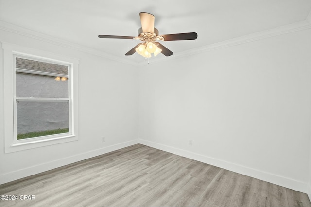 unfurnished room featuring ceiling fan, crown molding, and light hardwood / wood-style floors