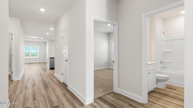 interior space featuring plenty of natural light and light hardwood / wood-style floors