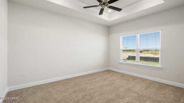 unfurnished living room with a raised ceiling, ceiling fan, crown molding, sink, and light hardwood / wood-style flooring