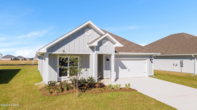 modern farmhouse with a front lawn and a garage