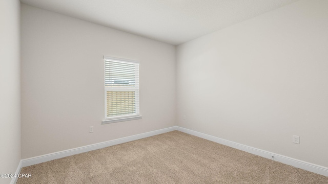 spare room with carpet flooring