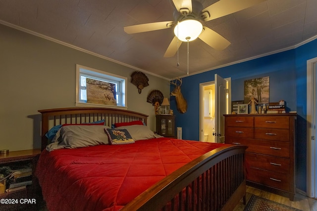 bedroom with ceiling fan, crown molding, and wood-type flooring