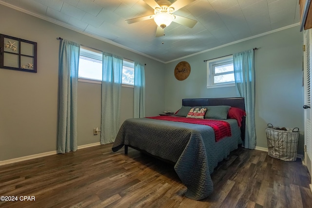 bedroom featuring ceiling fan, dark wood-type flooring, and ornamental molding