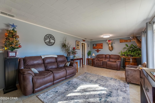 tiled living room featuring ornamental molding