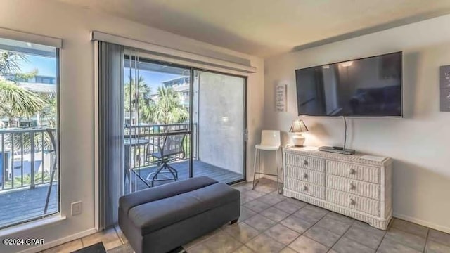 interior space with tile patterned floors and plenty of natural light