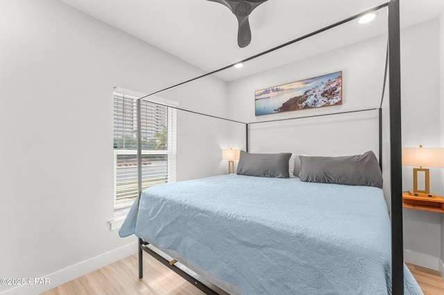 bedroom with light wood-style floors, recessed lighting, baseboards, and a ceiling fan